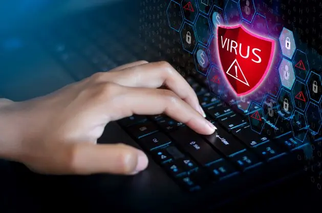 Laptop showing virus notification